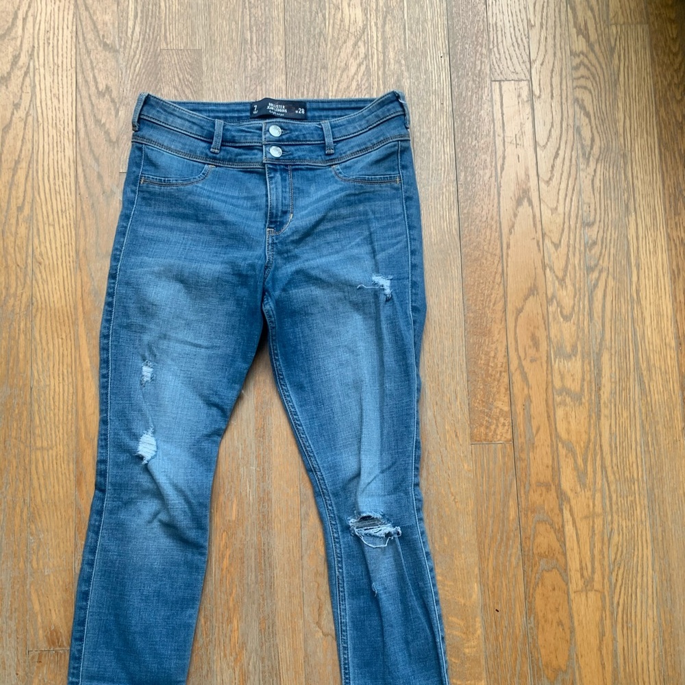 High waisted light wash jeans with some distress